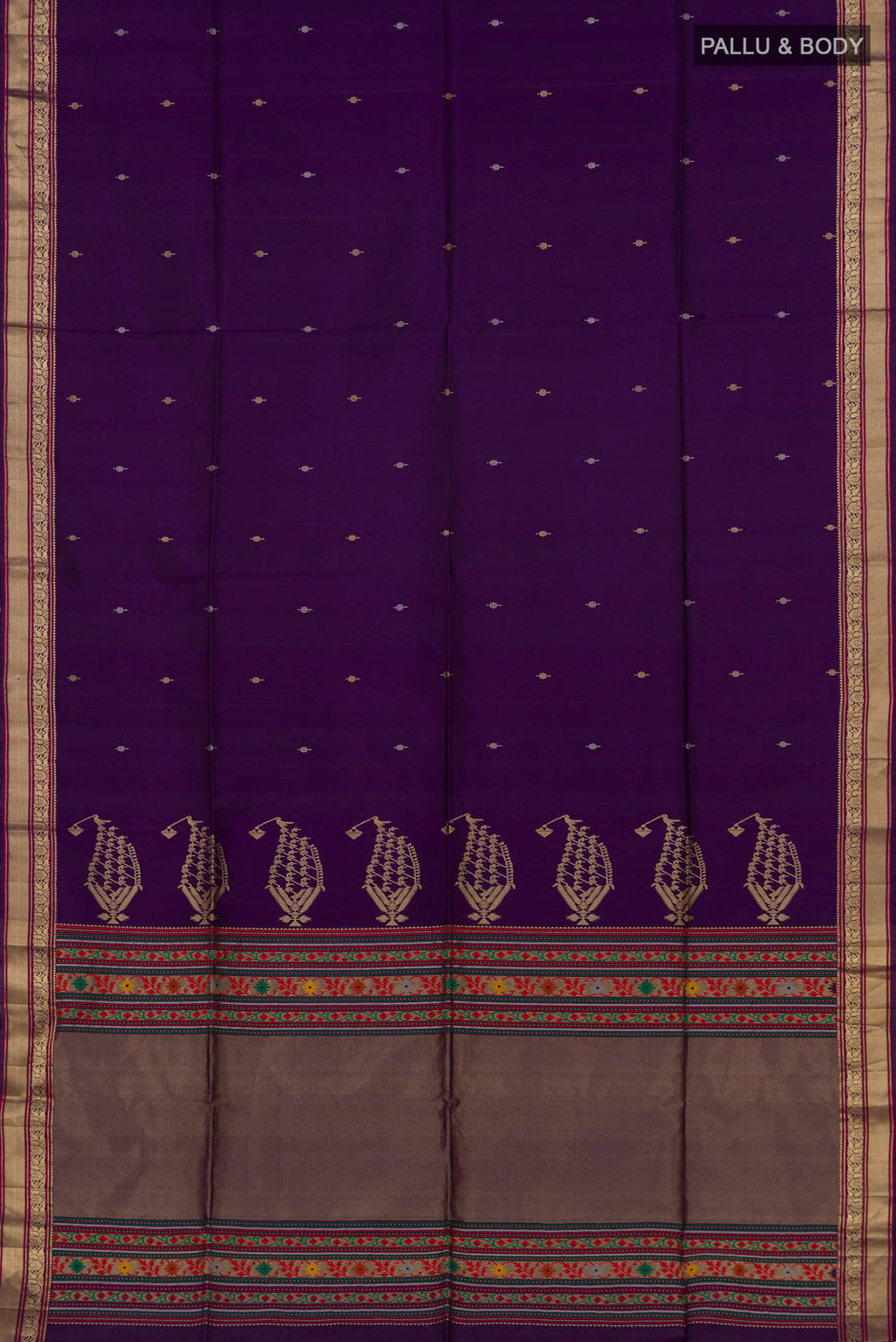 Flat view of Purple Soft Silk Saree with Zari Butta on the body and Zari Border. 