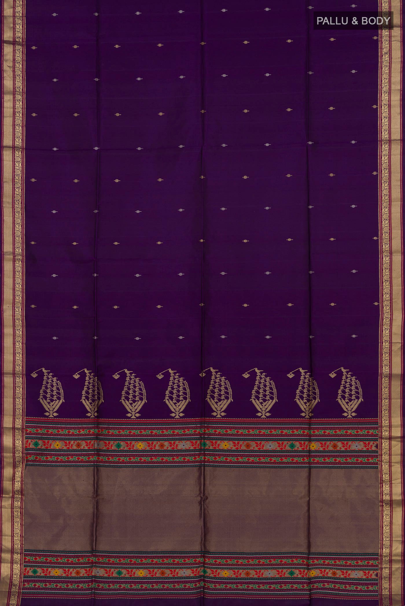 Flat view of Purple Soft Silk Saree with Zari Butta on the body and Zari Border. 