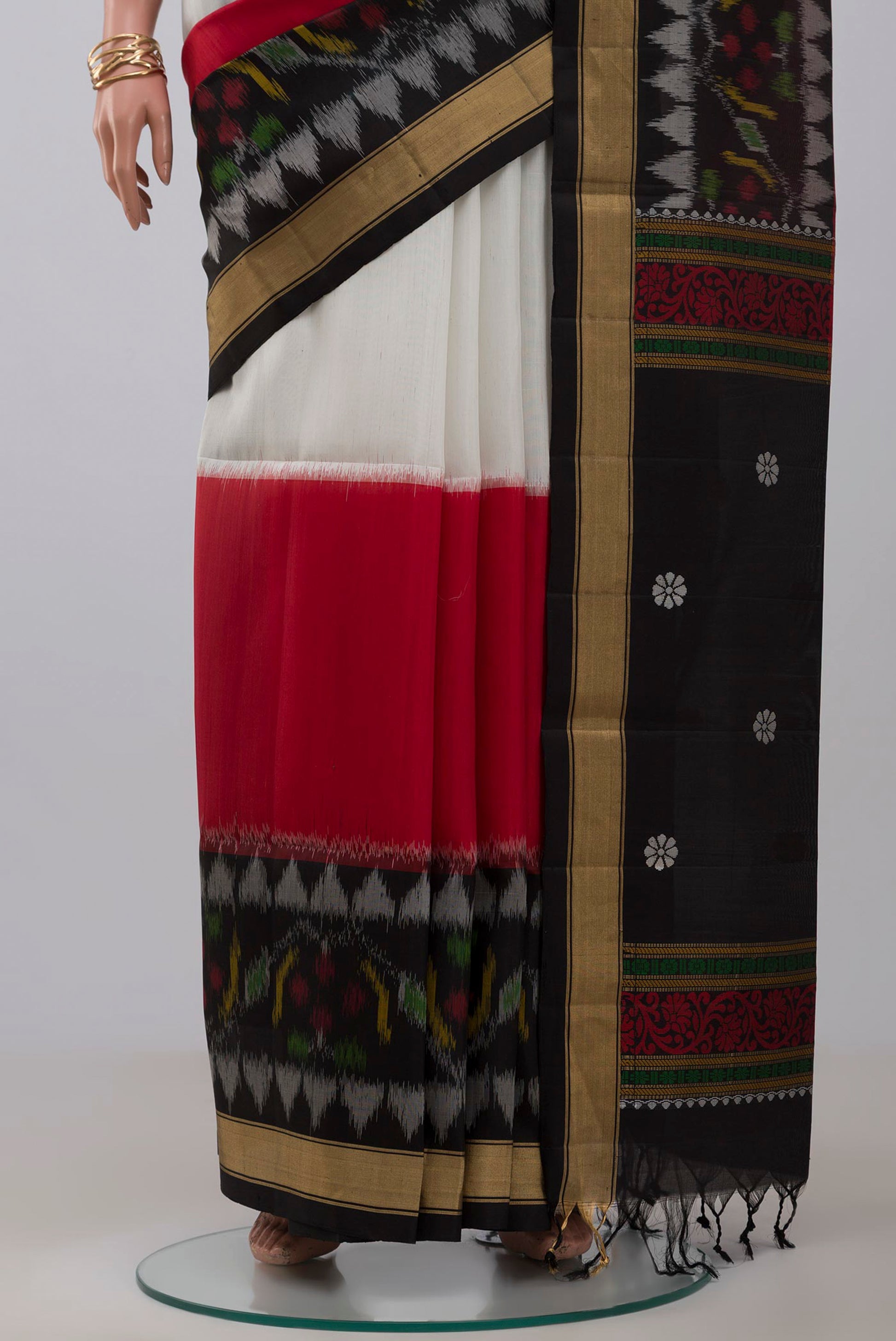 Pleats and pallu of Multi Color Soft Silk Saree with Plain Body and Zari Border. 