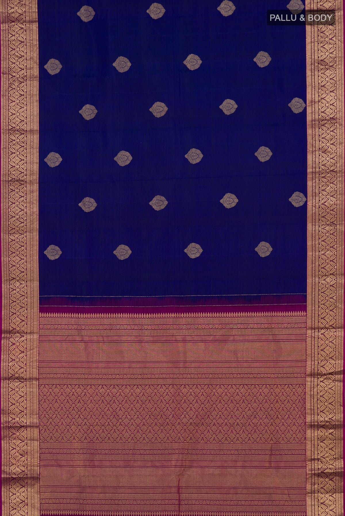 Flat view of Blue Kanchipuram Saree with Zari Butta on the body and Zari Border. 