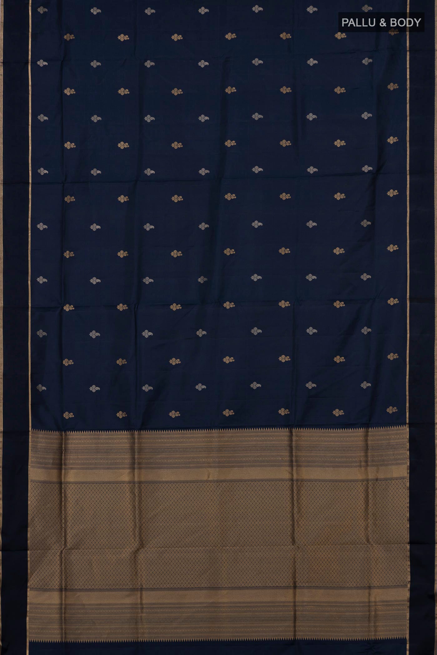 Flat view of Navy Blue Soft Silk Saree with Zari Butta on the body and Thin Zari Line. 