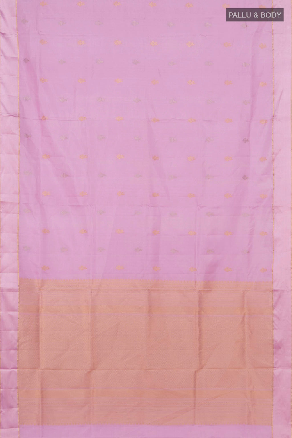Flat view of Lavender Soft Silk Saree with Zari Butta on the body and Thin Zari Line. 