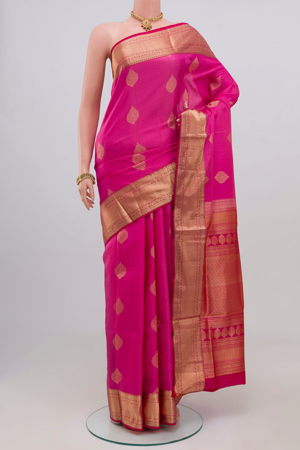Pink Soft Silk Saree with Jacquard With Zari Butta on the body and Zari Border.  displayed on a mannequin