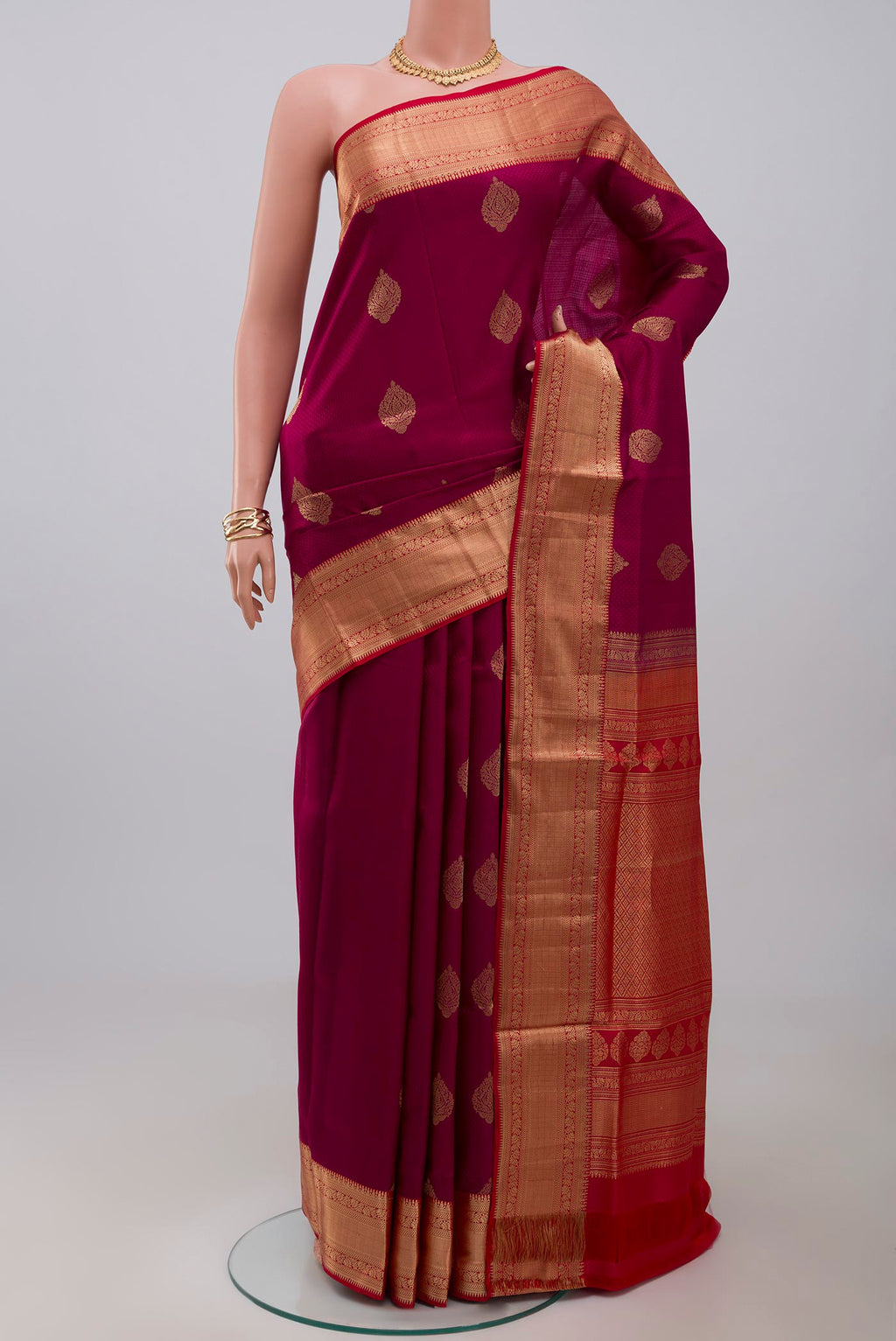 Purple Soft Silk Saree with Jacquard With Zari Butta on the body and Zari Border.  displayed on a mannequin