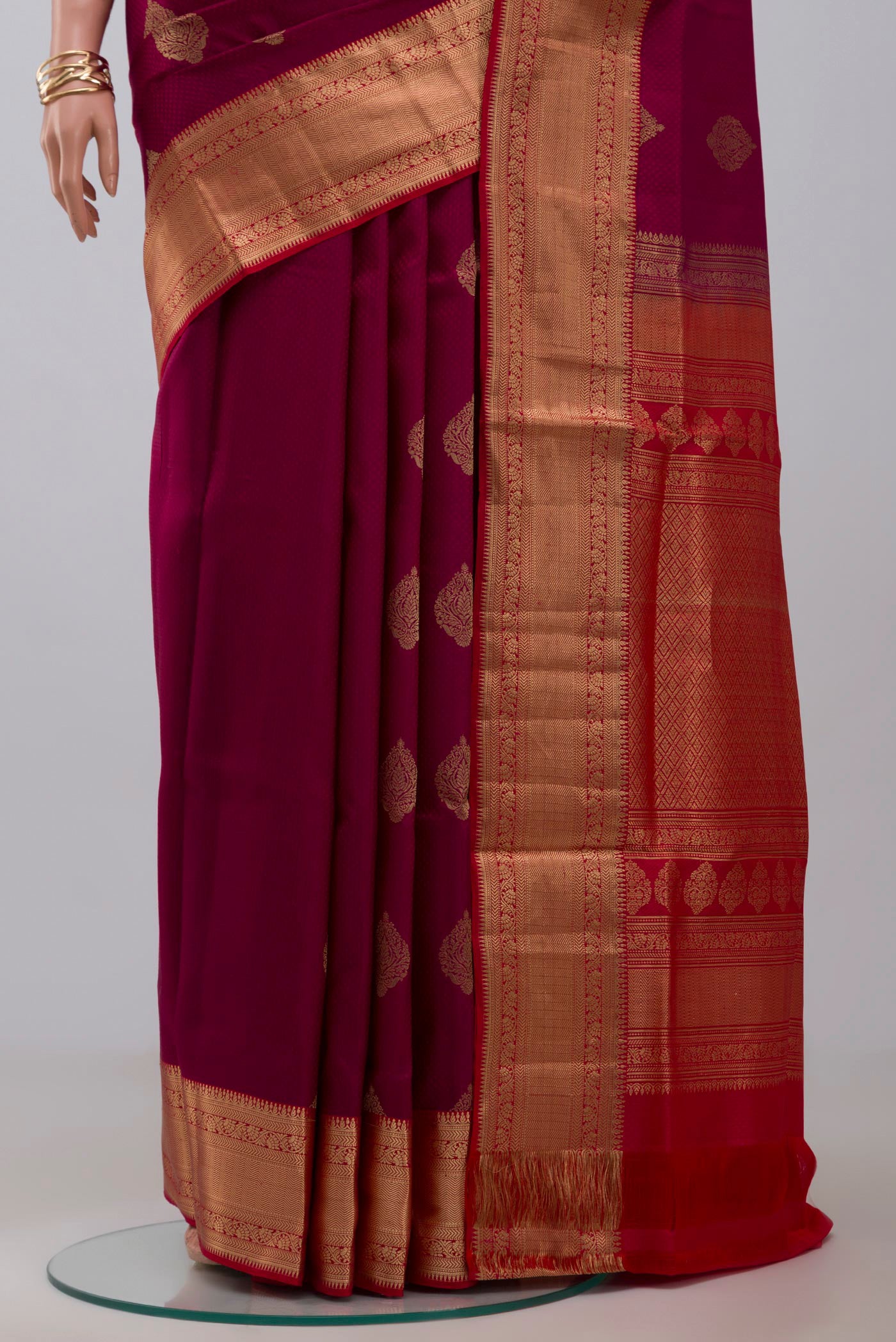 Pleats and pallu of Purple Soft Silk Saree with Jacquard With Zari Butta on the body and Zari Border. 