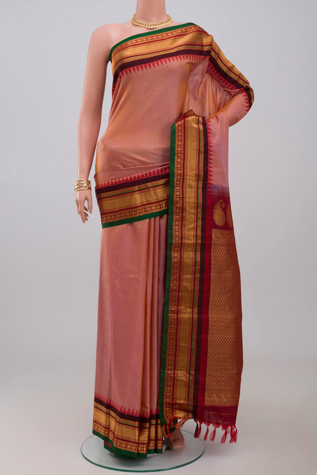 Pink Gadwal Silk Saree with Zari Butta on the body and Zari Border.  displayed on a mannequin