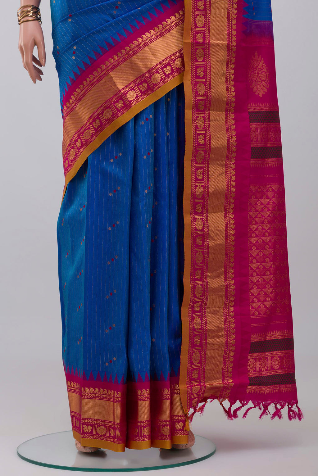 Pleats and pallu of Blue Gadwal Silk Saree with Stripes on the body and Zari Border. 