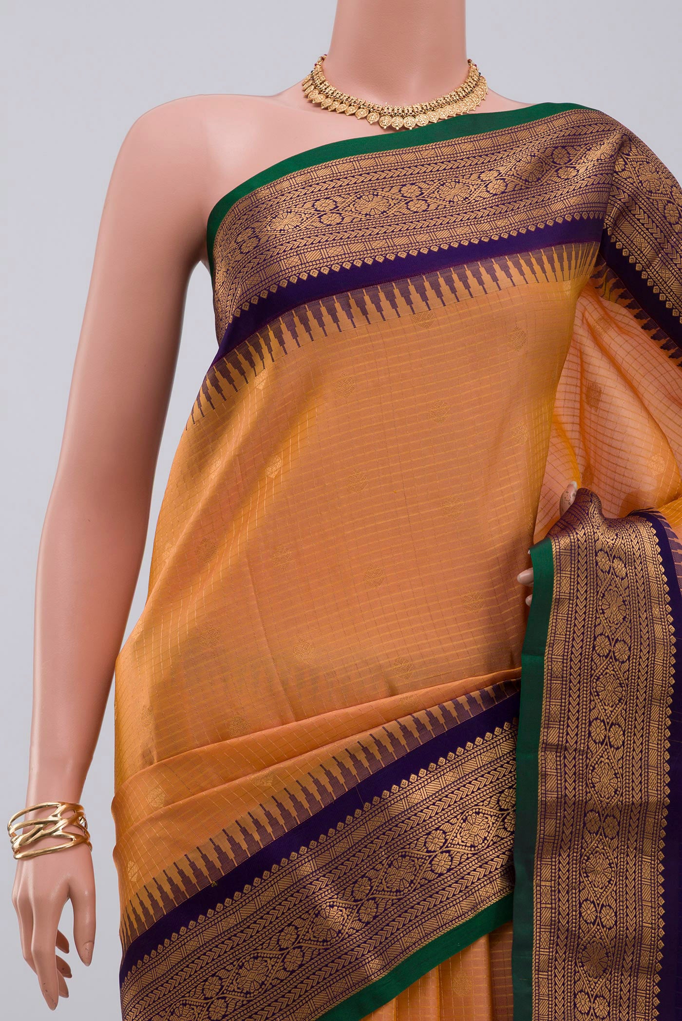 Border image of Peach Gadwal Silk Saree with Checked design on the body and Zari Border. 