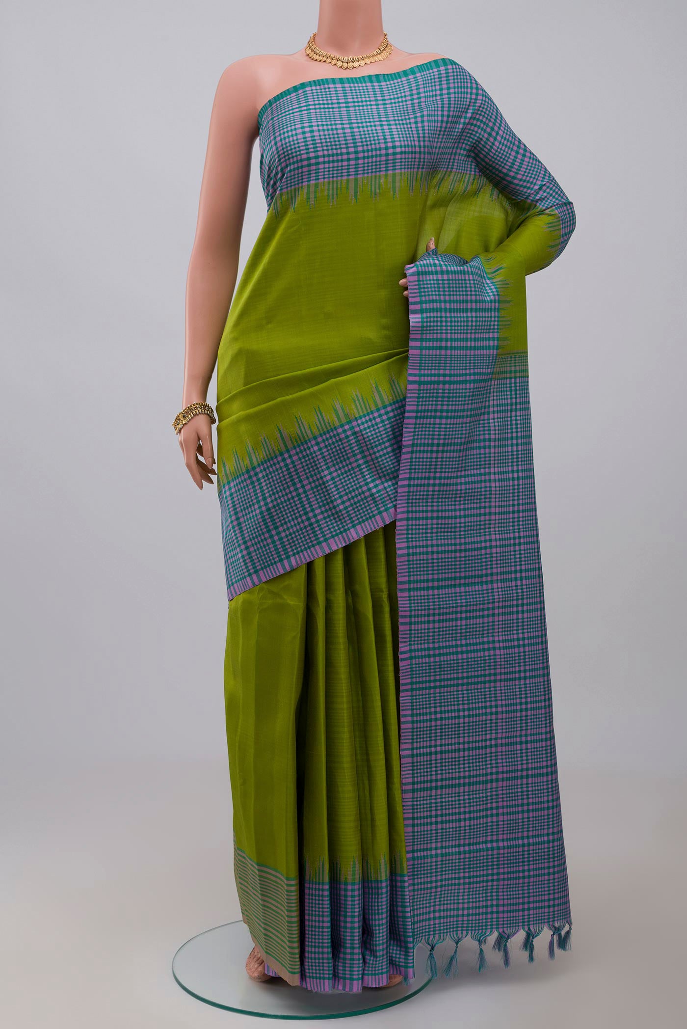 Parrot Green Gadwal Silk Saree with Plain Body and Checks Border.  displayed on a mannequin