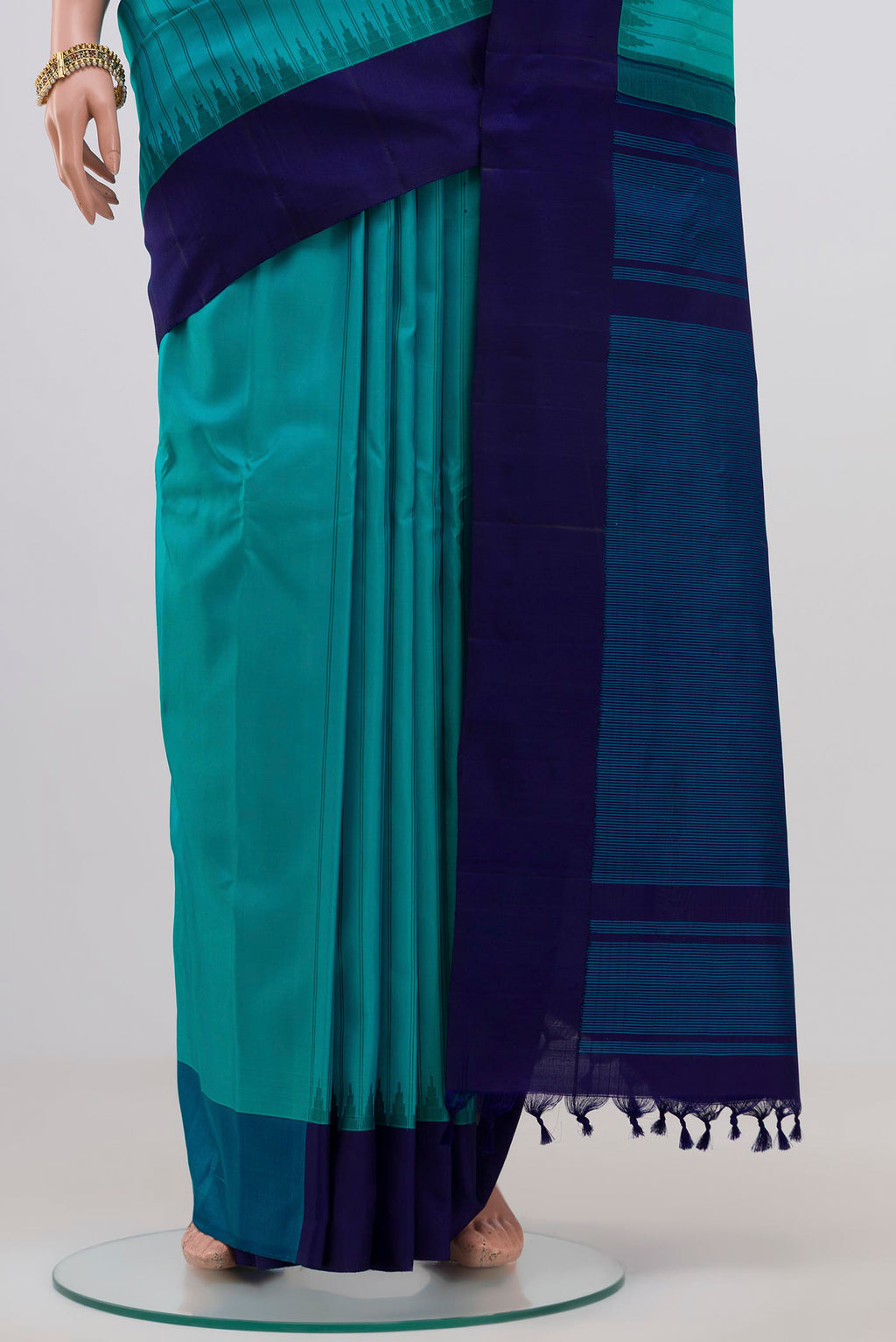 Pleats and pallu of Sky Blue Gadwal Silk Saree with Stripes on the body and Plain Border. 