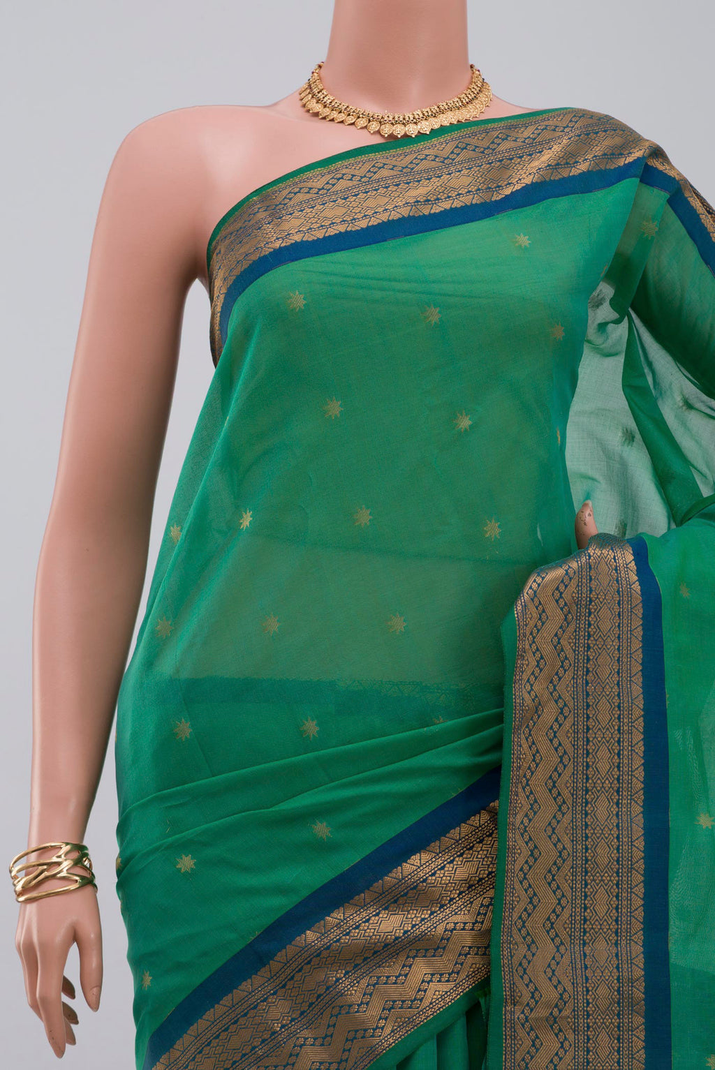 Border image of Green Gadwal Silk Cotton Saree with Zari Butta on the body and Zari Border. 