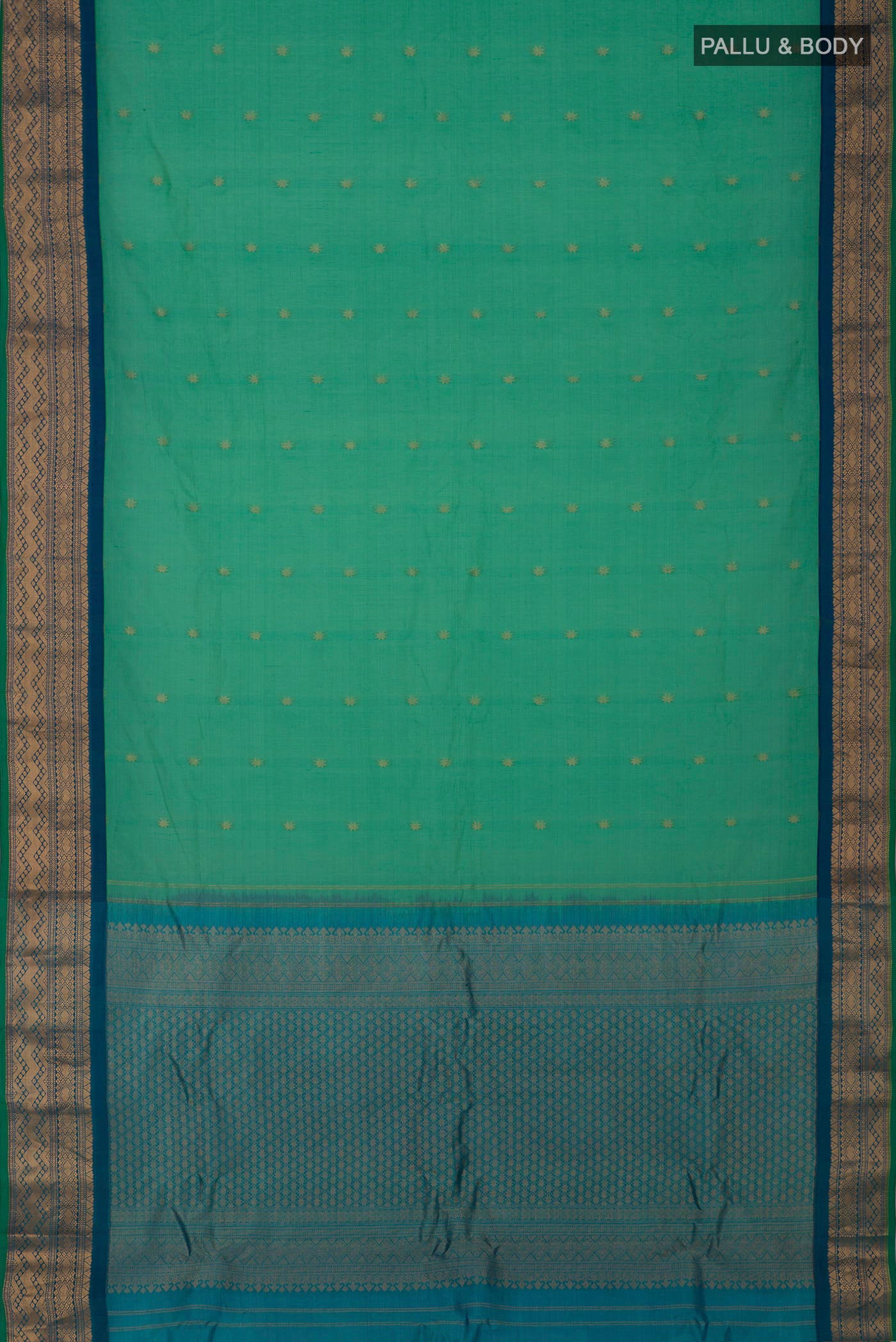 Flat view of Green Gadwal Silk Cotton Saree with Zari Butta on the body and Zari Border. 