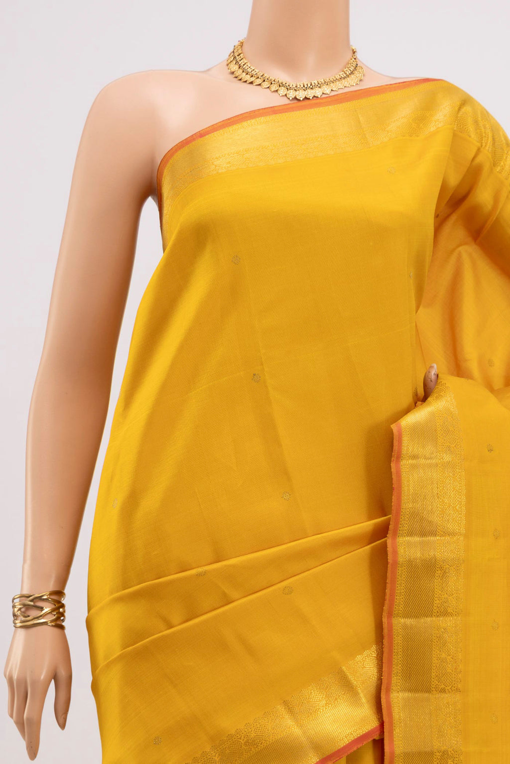 Border image of Pure Silk Pure Zari Yellow Kanjivaram Saree with Zari Butta on the body and Zari Border. 