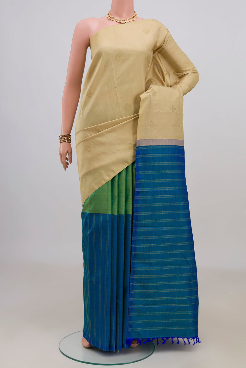 Pure Silk Pure Zari Multi Color Kanchipuram Saree with Half And Half on the body and Without Border.  displayed on a mannequin