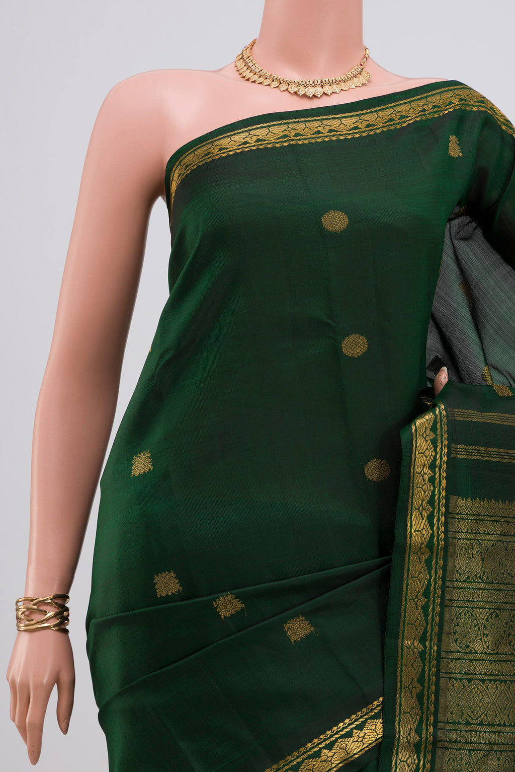 Border image of Pure Silk Pure Zari Green Kanchipuram Saree with Zari Butta on the body and Zari Border. 
