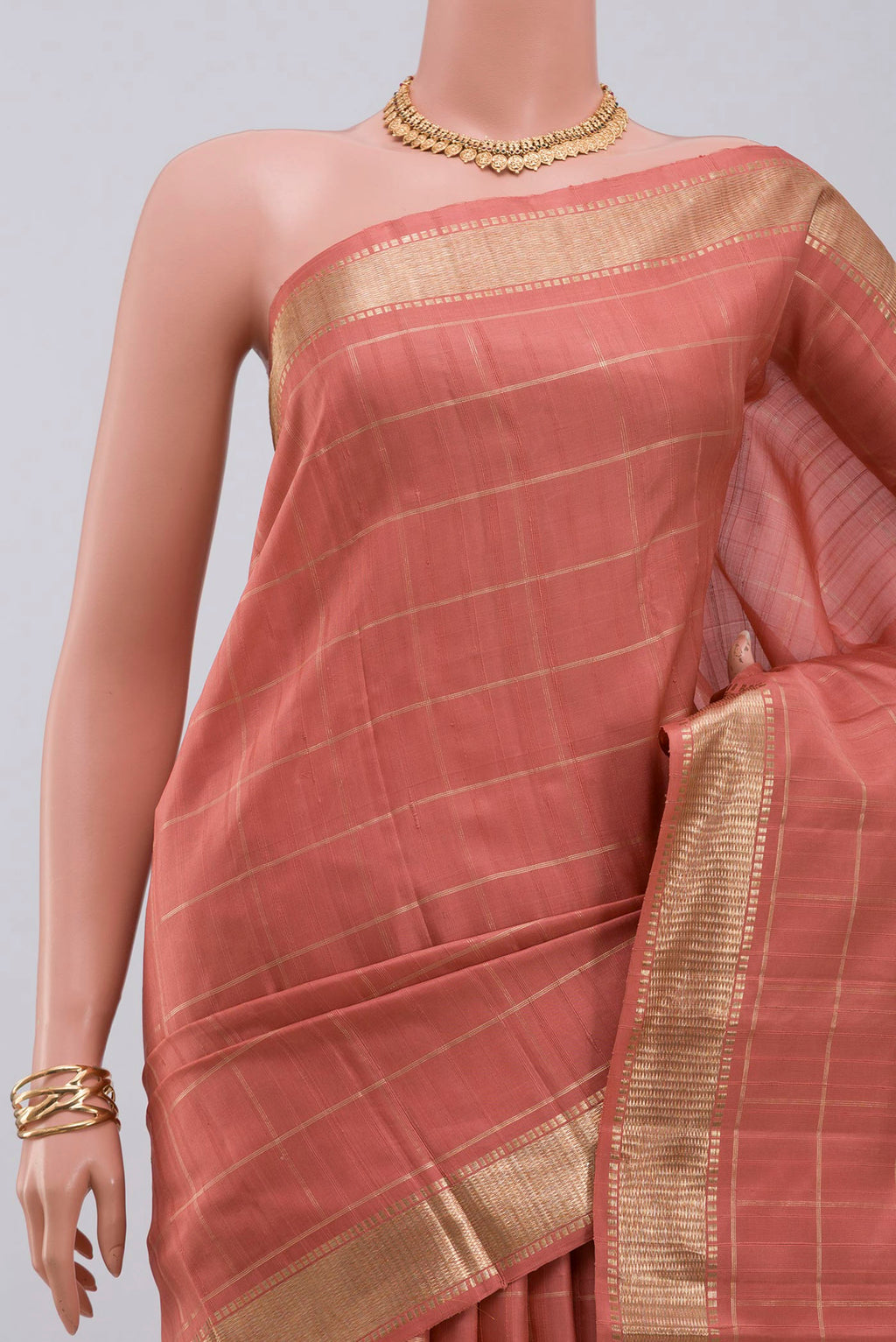 Border image of Pure Silk Pure Zari Peach Kanchipuram Saree with Checked design on the body and Zari Border. 