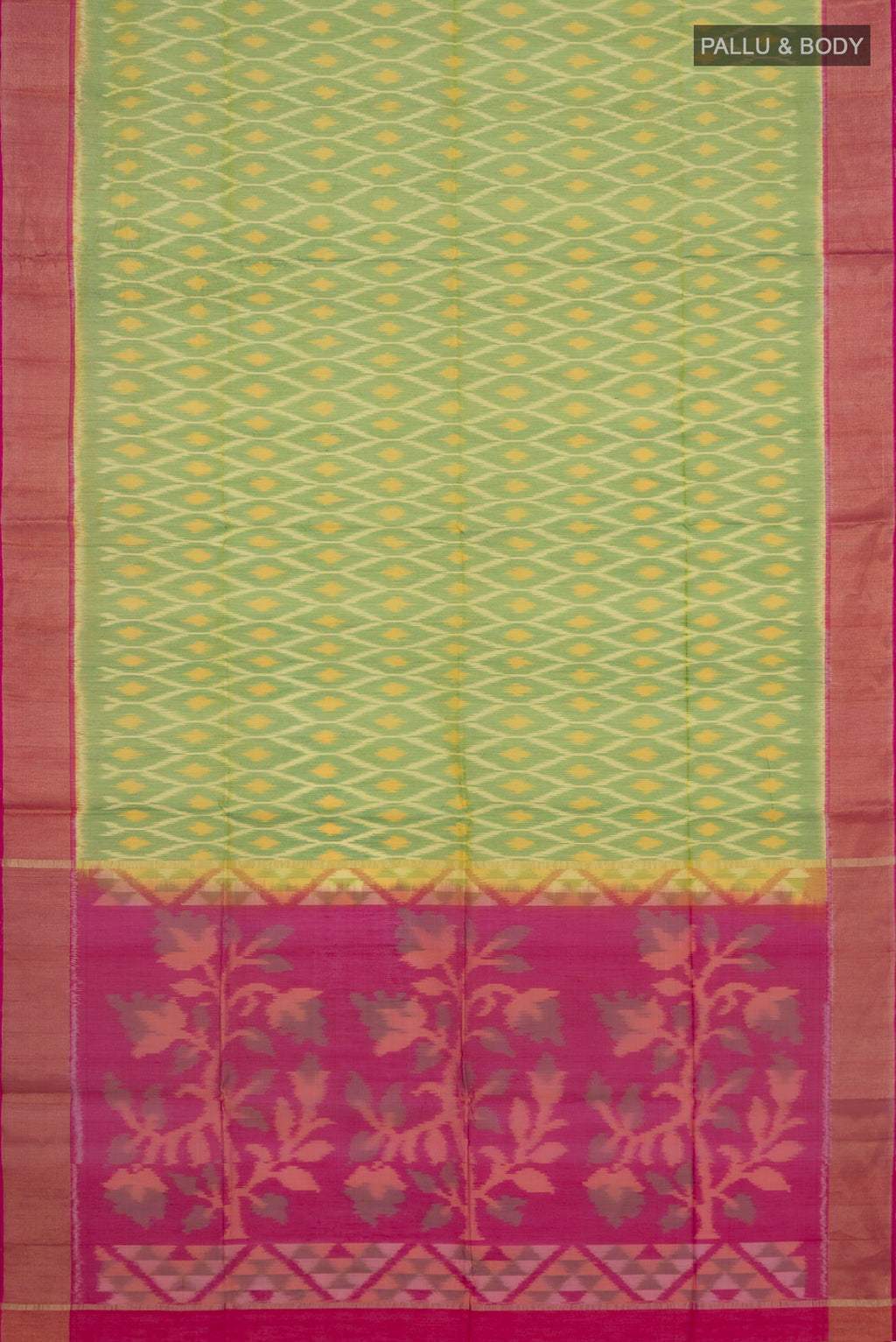 Flat view of Light Green Silk Cotton Saree with Ikat design on the body and Zari Border. 