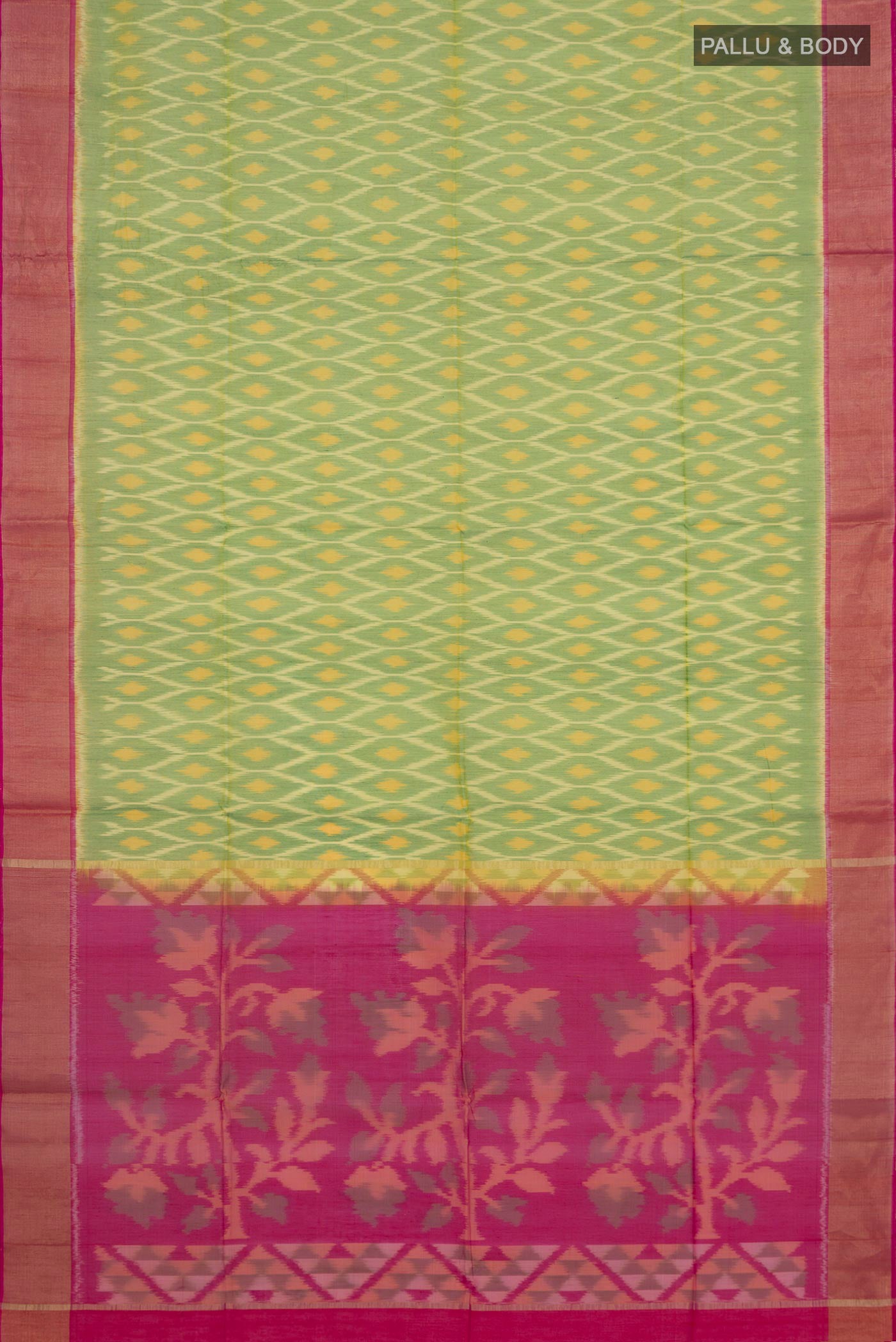 Flat view of Light Green Silk Cotton Saree with Ikat design on the body and Zari Border. 
