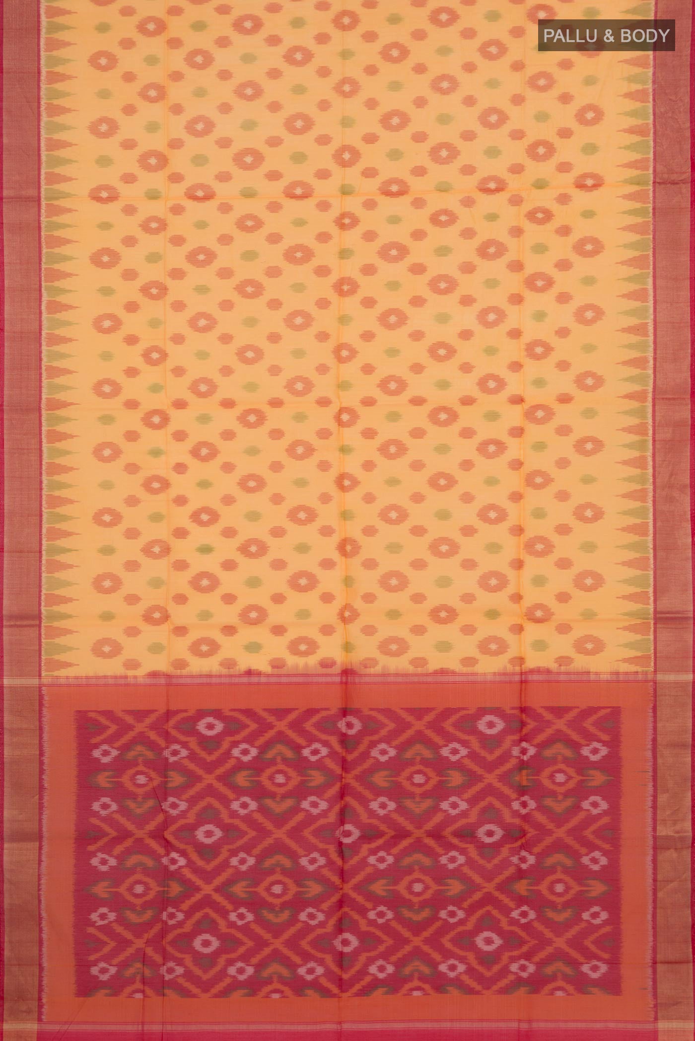 Flat view of Yellow Silk Cotton Saree with Ikat design on the body and Zari Border. 