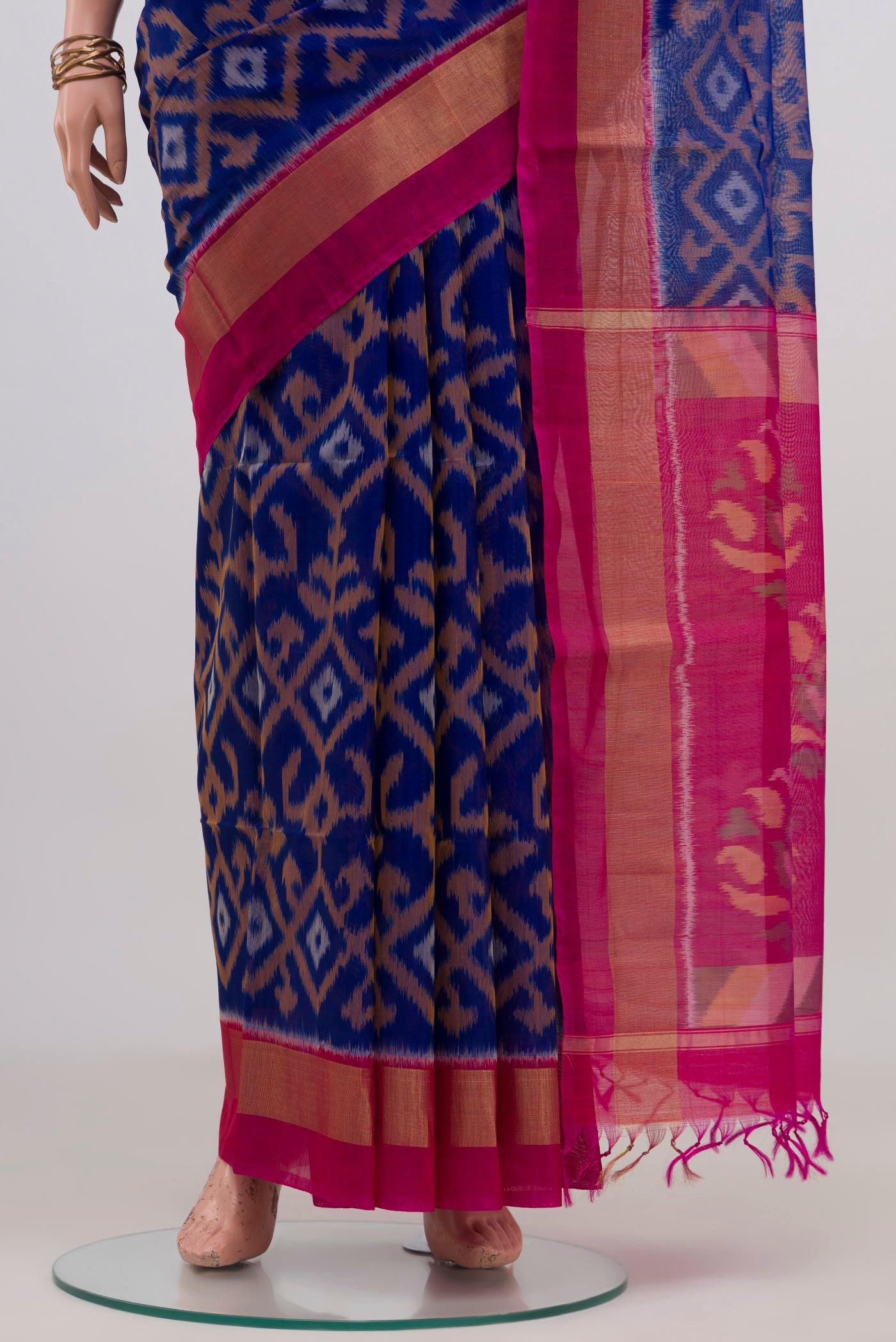 Pleats and pallu of Royal Blue Silk Cotton Saree with Ikat design on the body and Zari Border. 