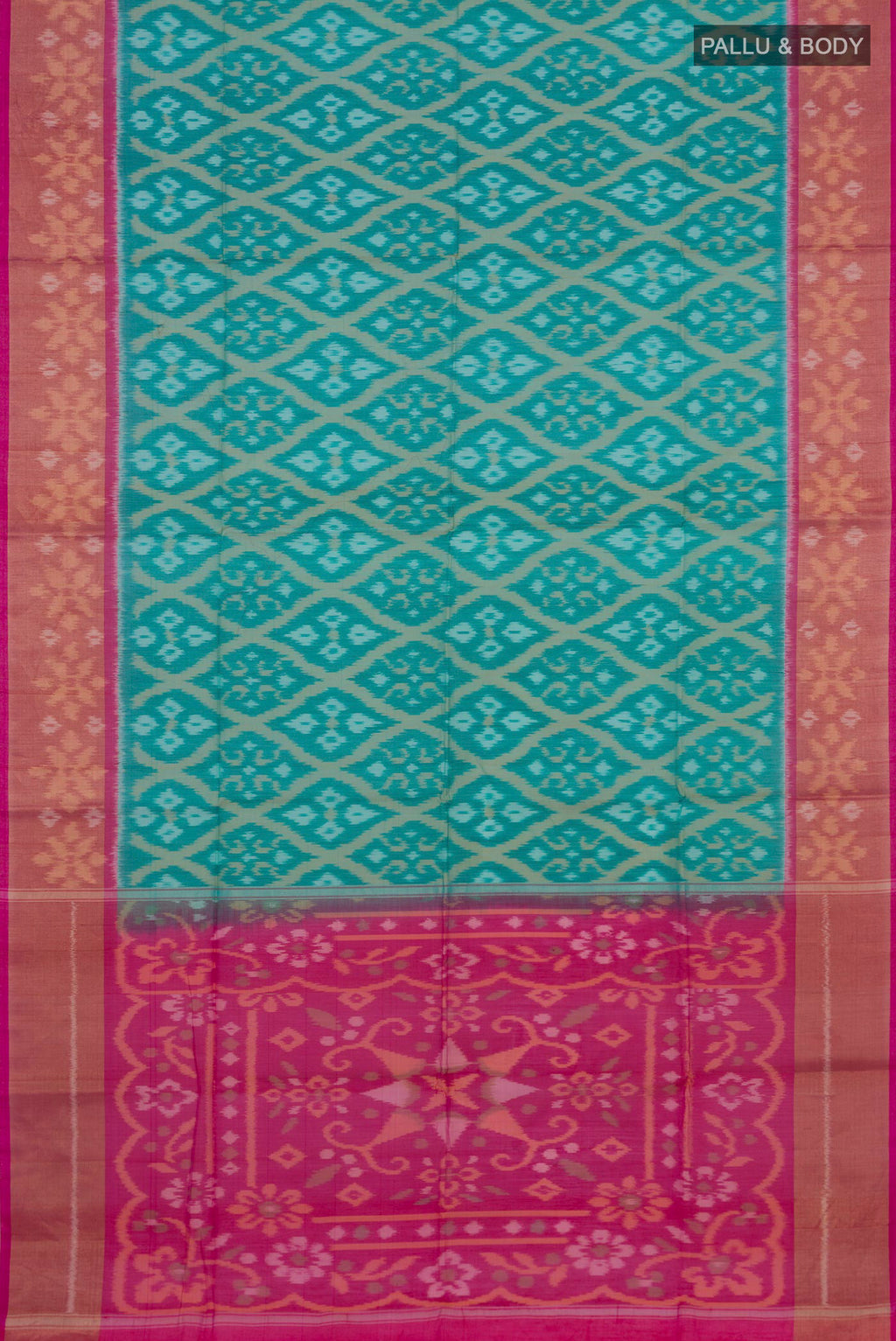 Flat view of Turquoise Silk Cotton Saree with Ikat design on the body and Zari Border. 
