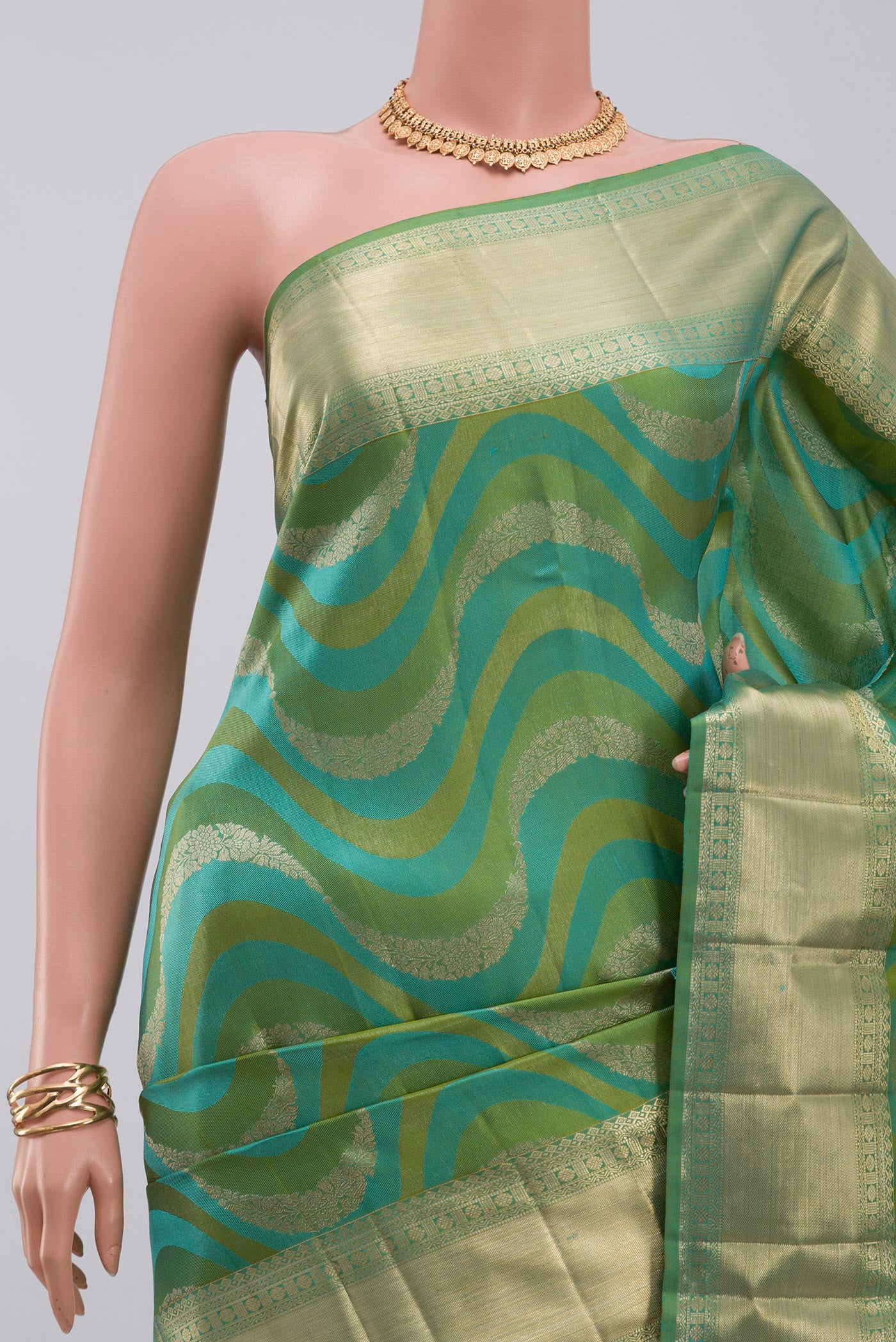 Border image of Green Kanjivaram Silk Saree with Zari Brocade on the body and Zari Border. 