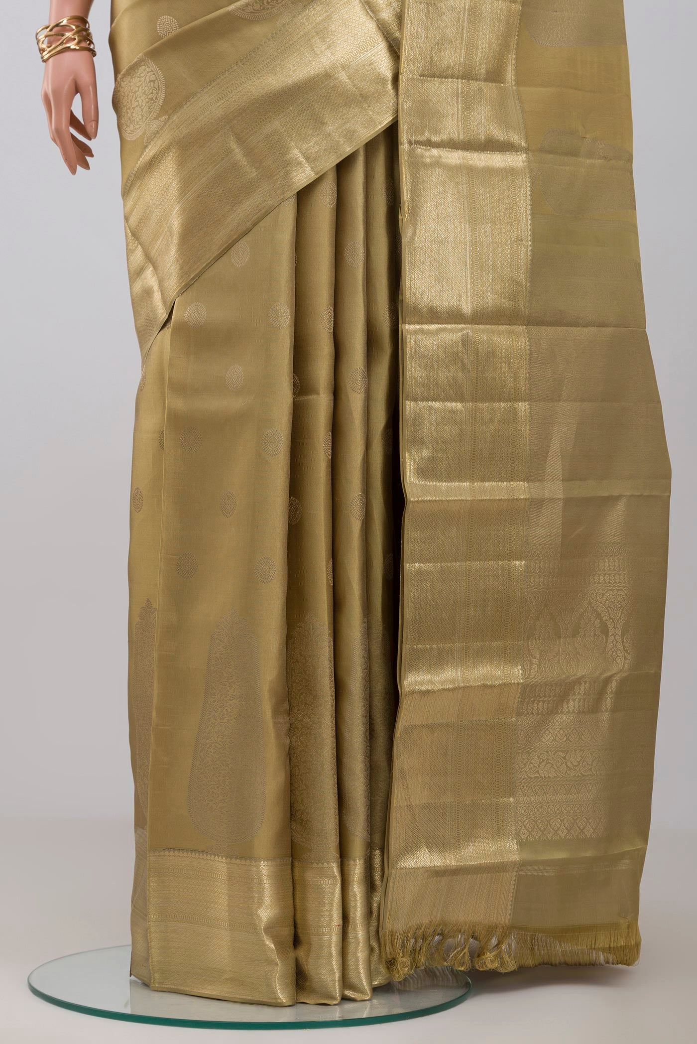 Pleats and pallu of Green Kanjivaram Silk Saree with Zari Brocade on the body and Zari Border. 
