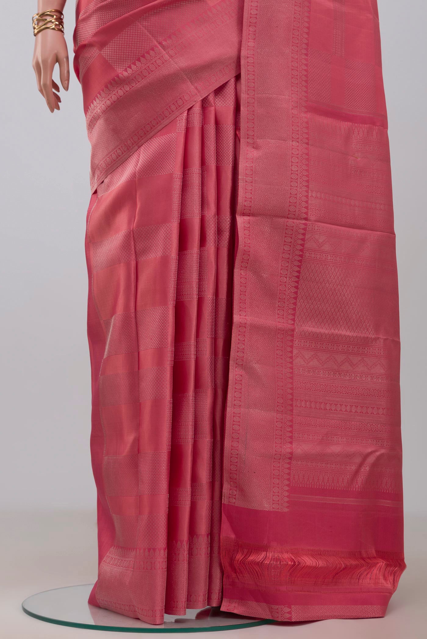 Pleats and pallu of Peach Kanjivaram Silk Saree with Zari Brocade on the body and Zari Border. 