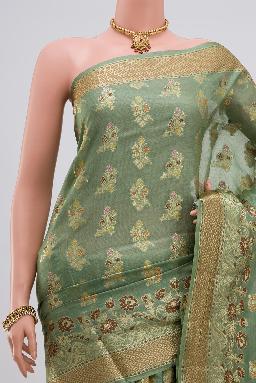Border image of Pista Green Tussar Silk Saree with Zari Butta on the body and Zari Border. 