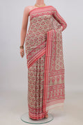 Beige Tussar Saree with Floral Print on the body and Thread Border.  displayed on a mannequin