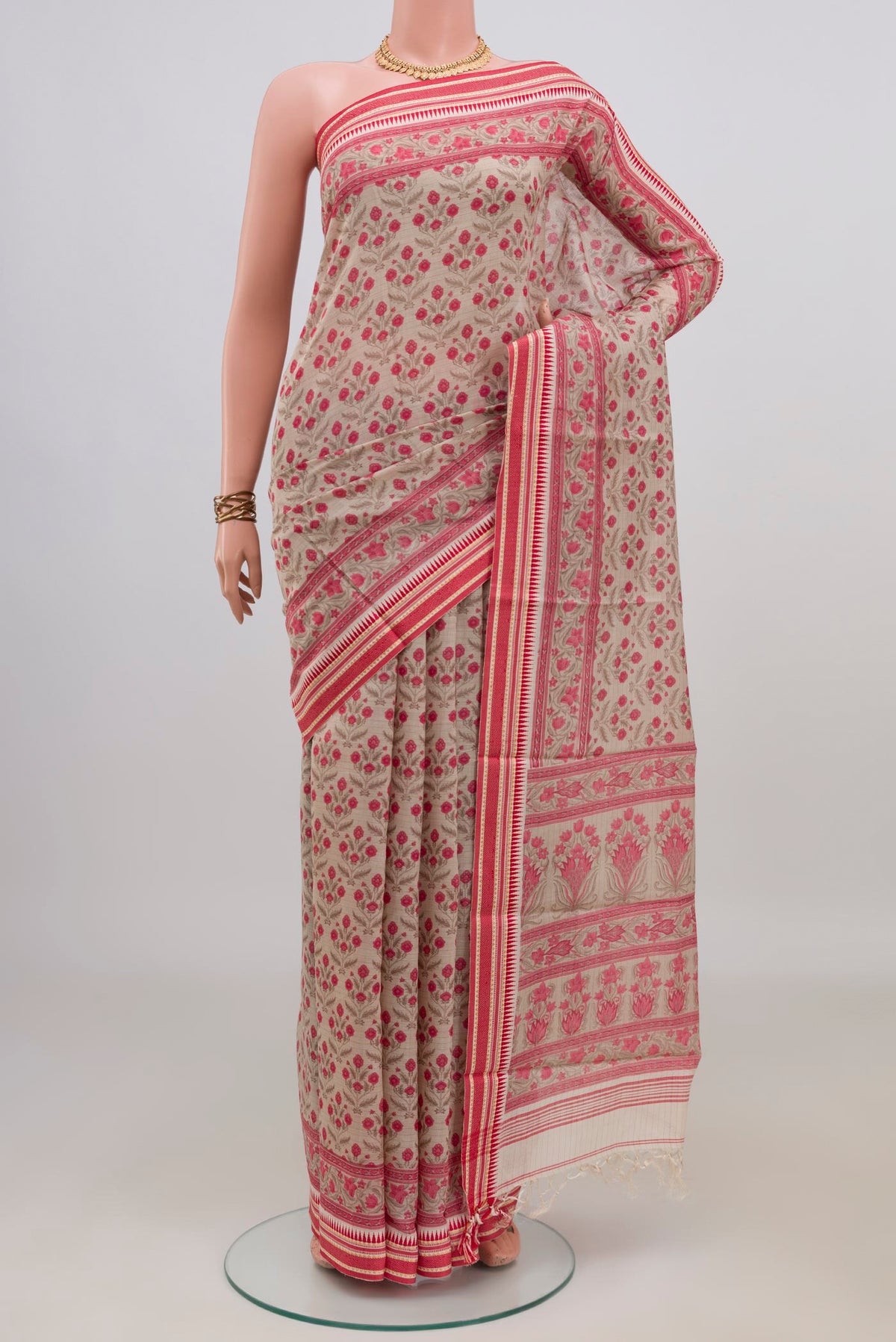 Beige Tussar Saree with Floral Print on the body and Thread Border.  displayed on a mannequin