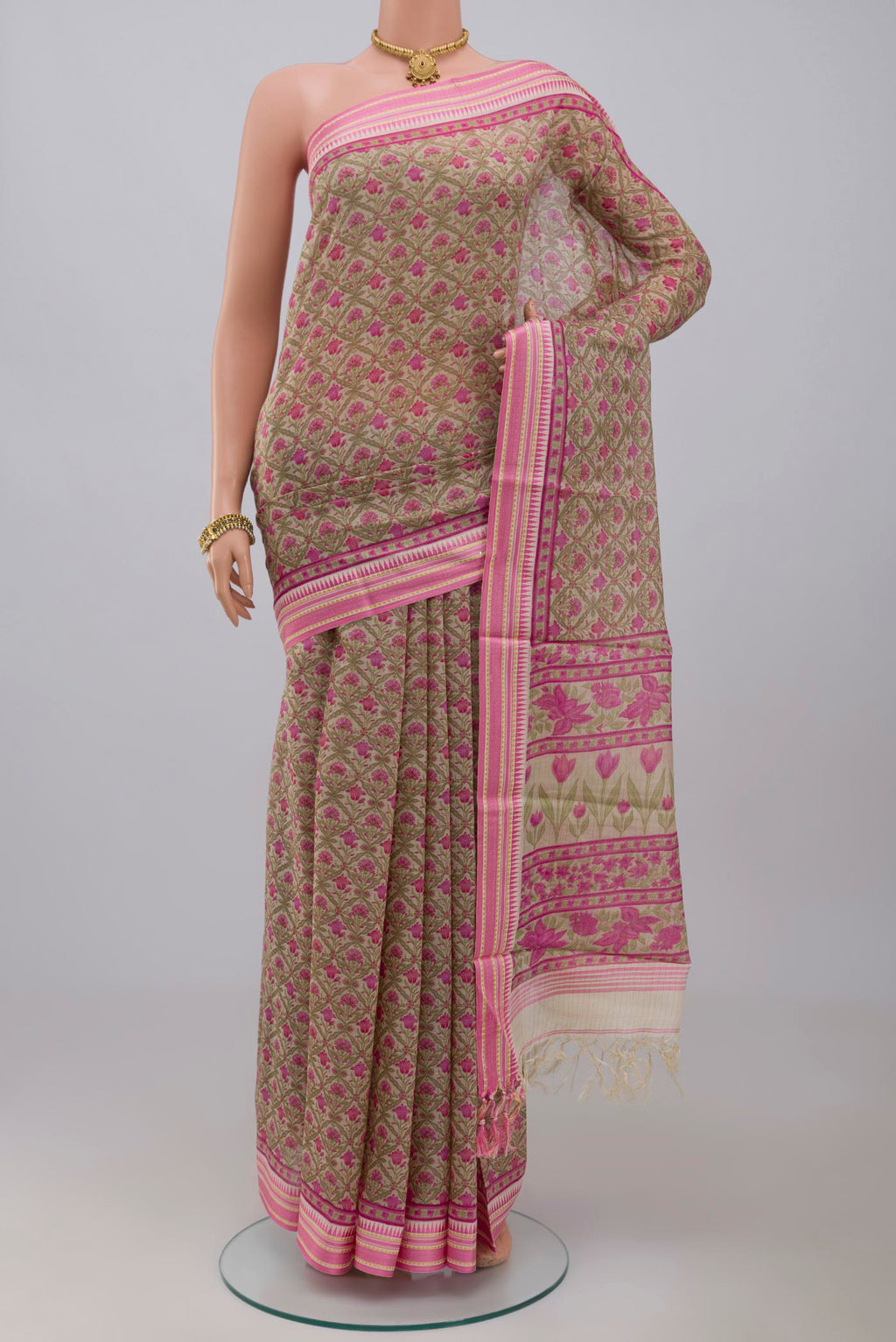 Cream Tussar Silk Saree with Printed design on the body and Thread Border.  displayed on a mannequin