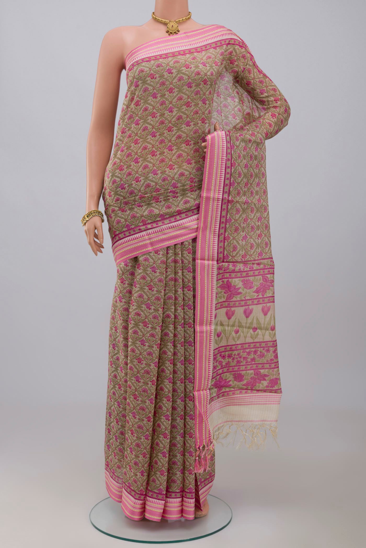 Cream Tussar Silk Saree with Printed design on the body and Thread Border.  displayed on a mannequin
