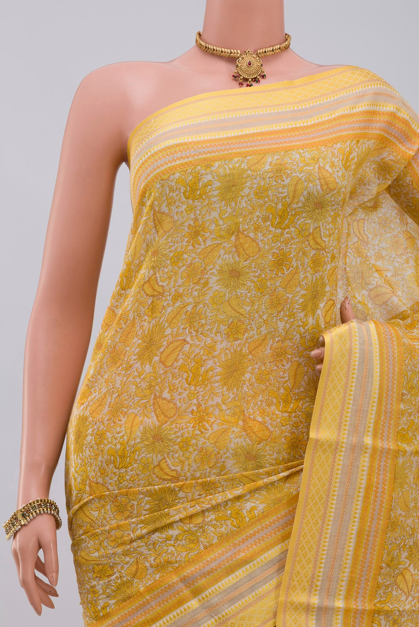 Border image of Yellow Tussar Silk Saree with Fancy on the body and Thread Border. 