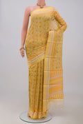 Yellow Tussar Silk Saree with Fancy on the body and Thread Border.  displayed on a mannequin