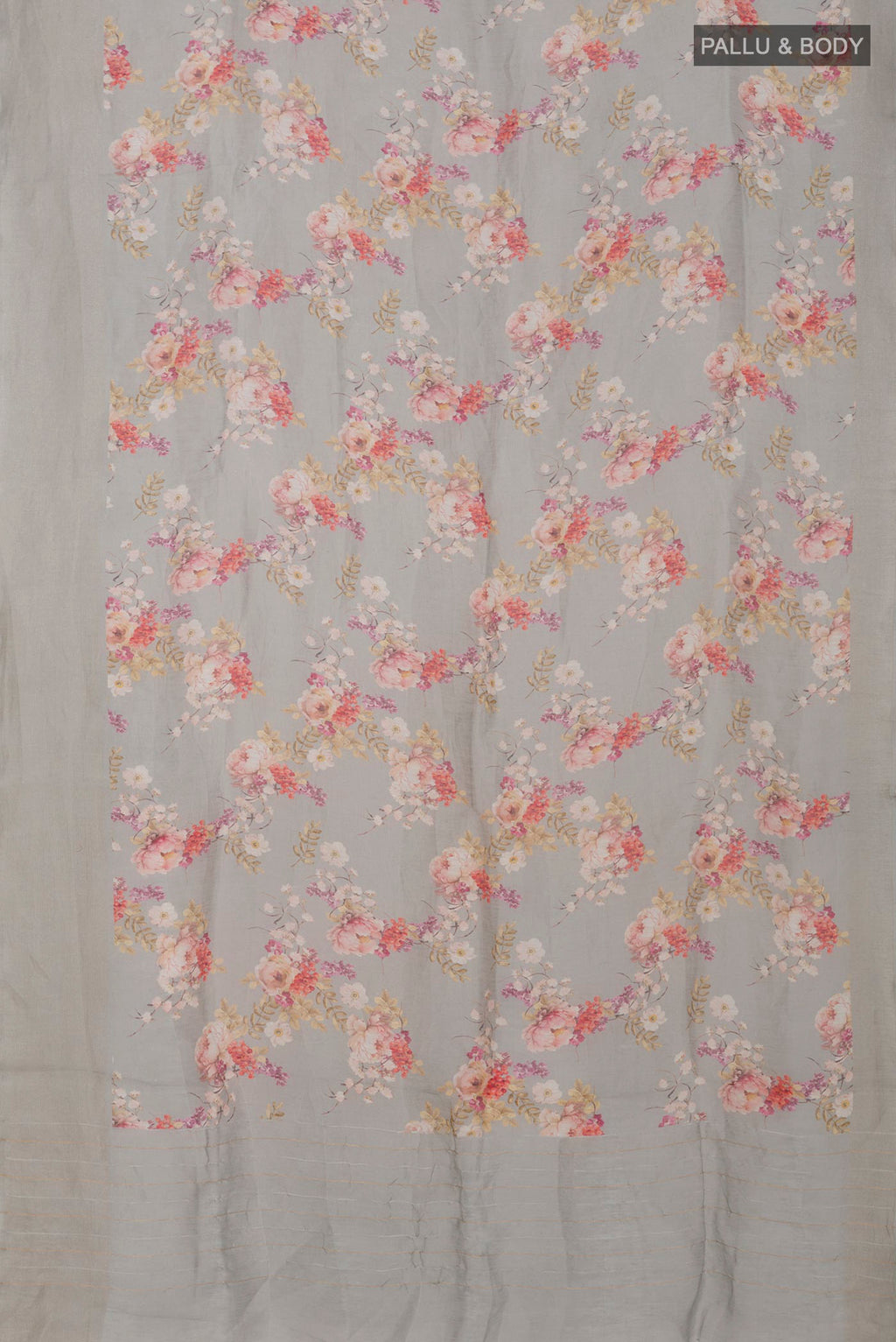 Flat view of Grey Linen Saree with Floral Print on the body and Thin Zari Line. 