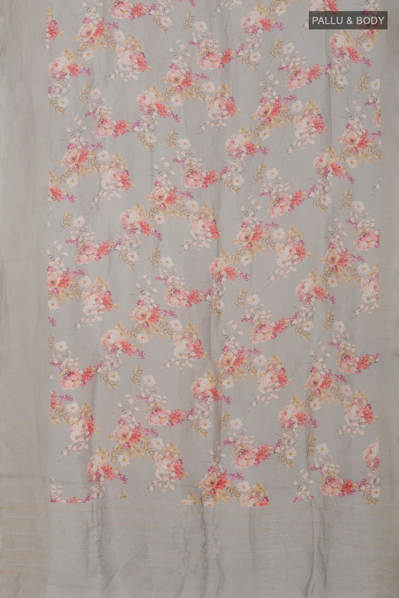 Flat view of Grey Linen Saree with Floral Print on the body and Thin Zari Line. 