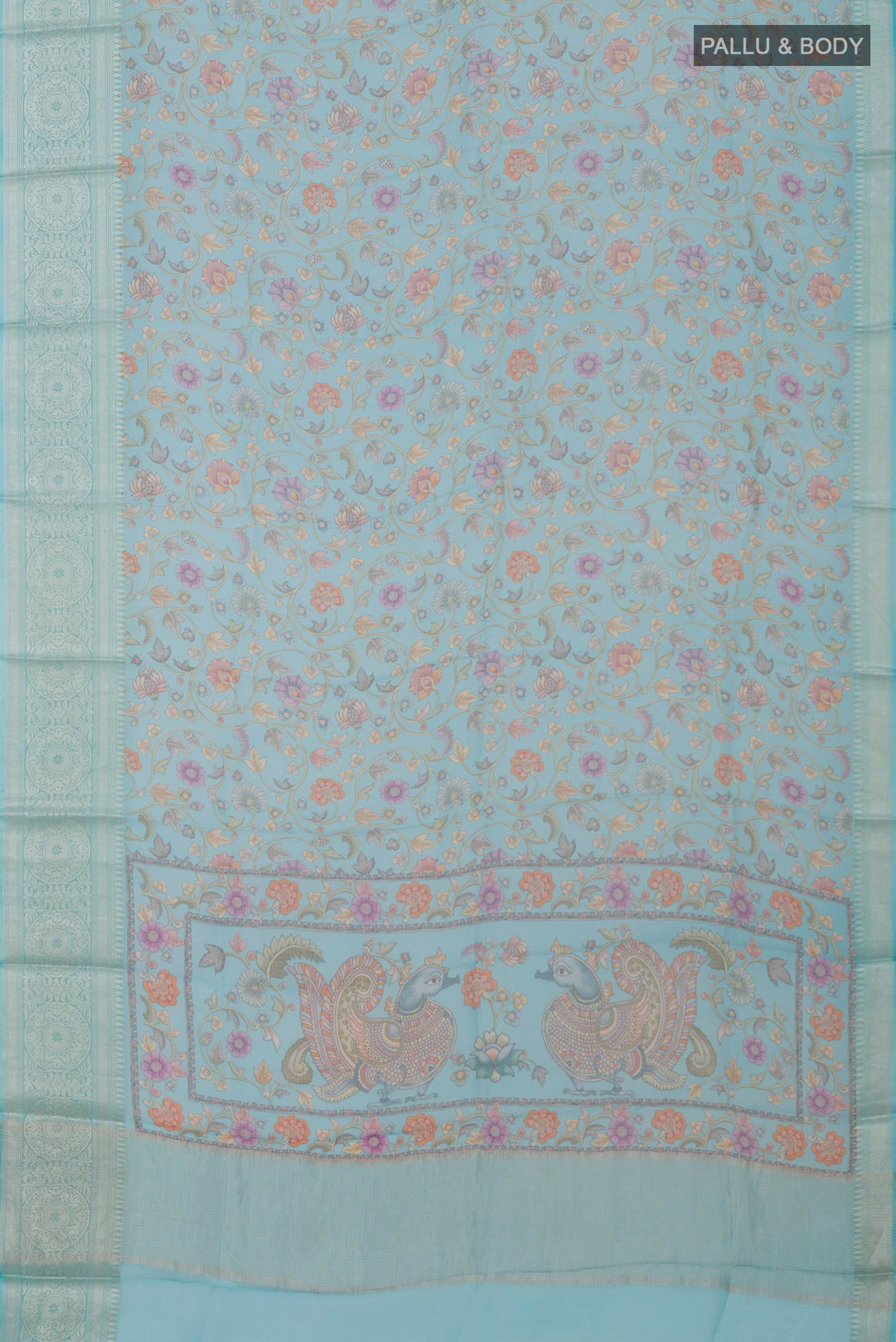 Flat view of Sky Blue Kota Silk Saree with Printed design on the body and Zari Border. 