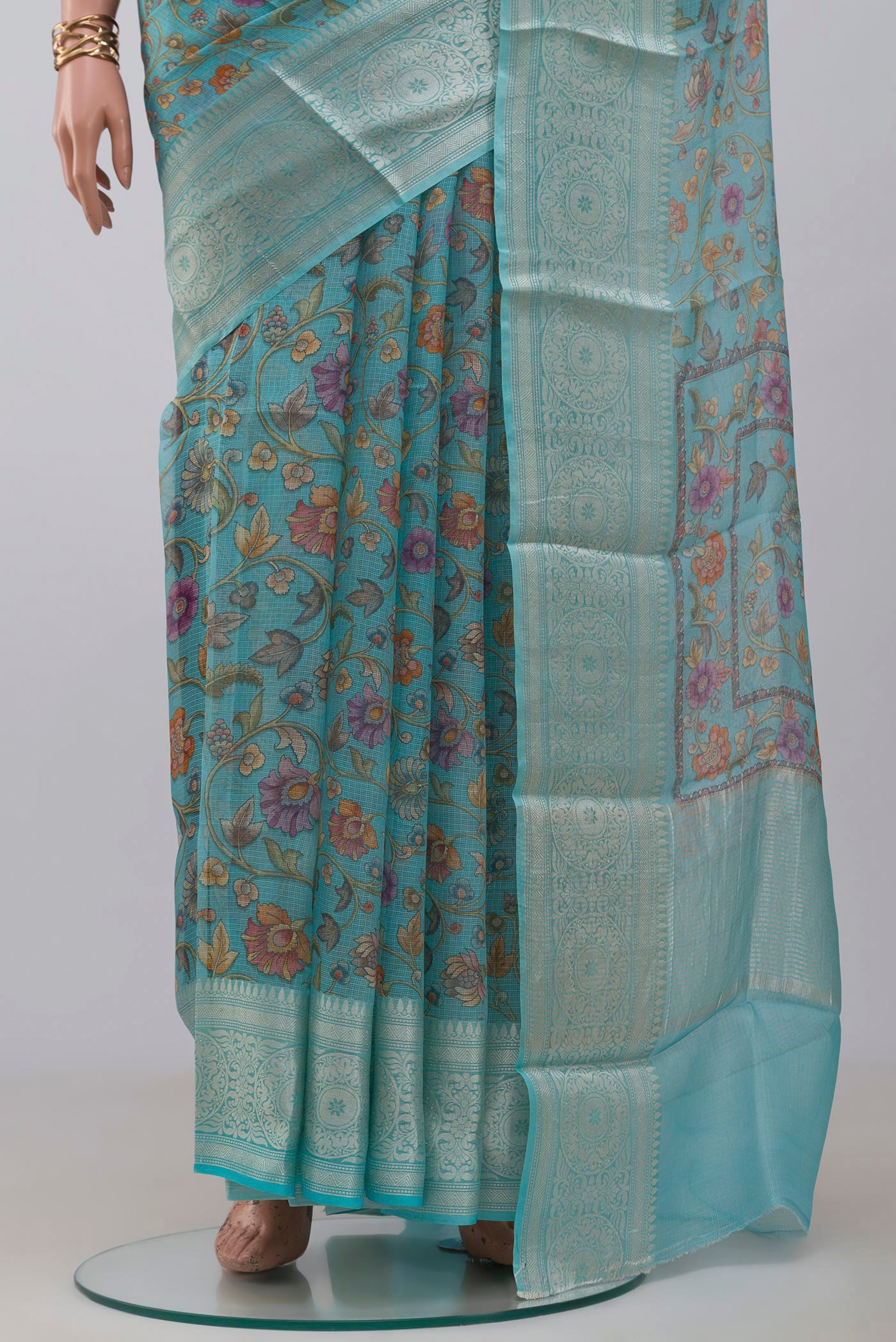 Pleats and pallu of Sky Blue Kota Silk Saree with Printed design on the body and Zari Border. 