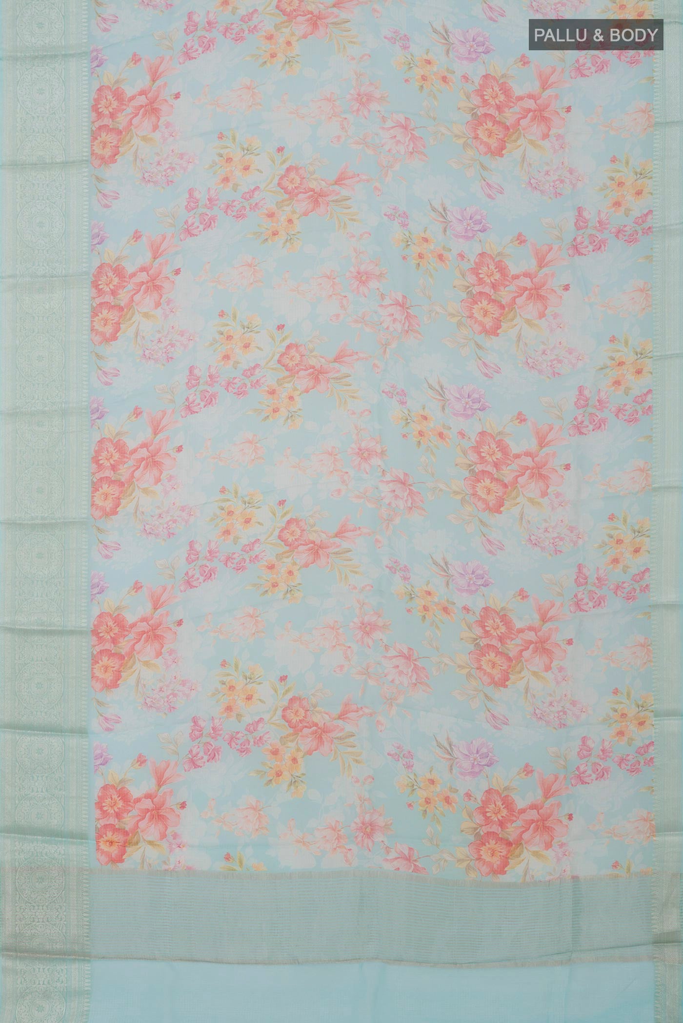 Flat view of Light Blue Kota Silk Saree with Floral Print on the body and Zari Border. 