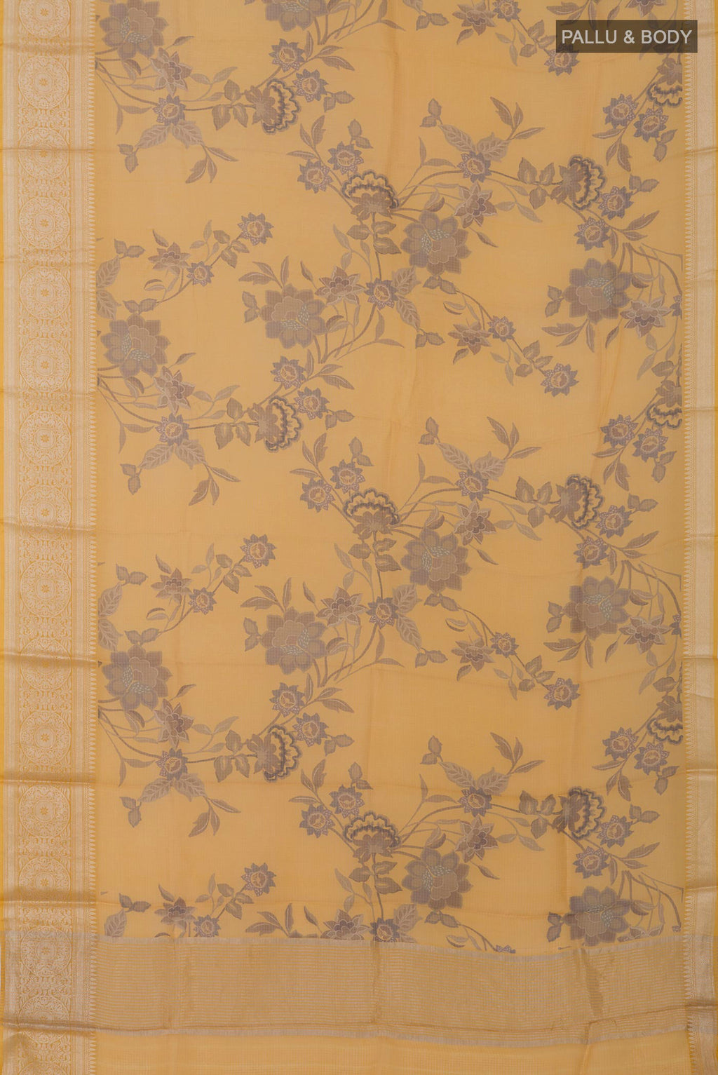 Flat view of Mustard Kota Silk Saree with Printed design on the body and Zari Border. 