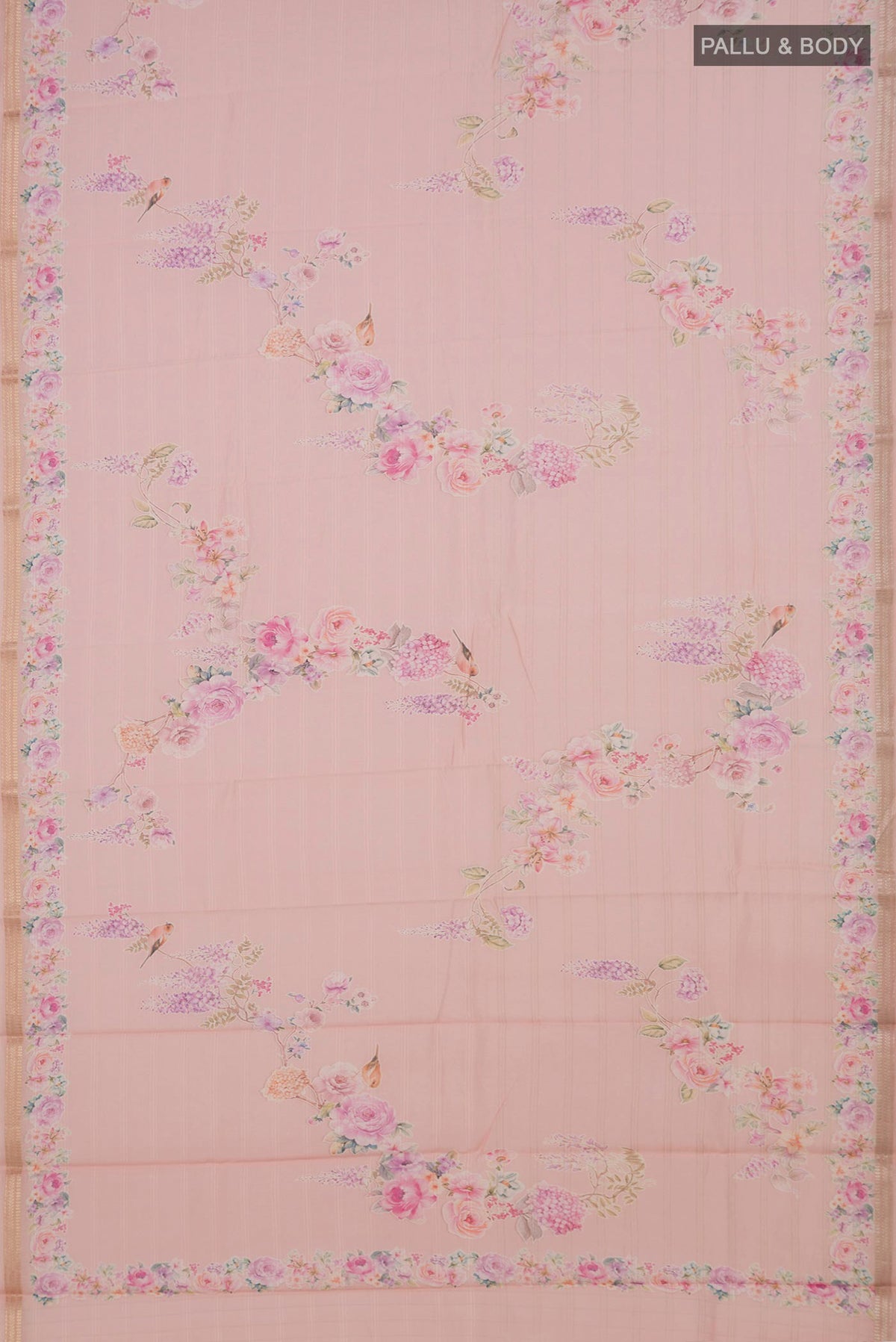 Flat view of Peach Tussar Saree with Floral Print on the body and Thin Zari Line. 