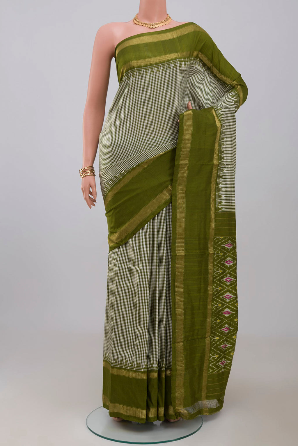 Multi Color Pochampally Silk Saree with Checked design on the body and Thin Zari Line.  displayed on a mannequin