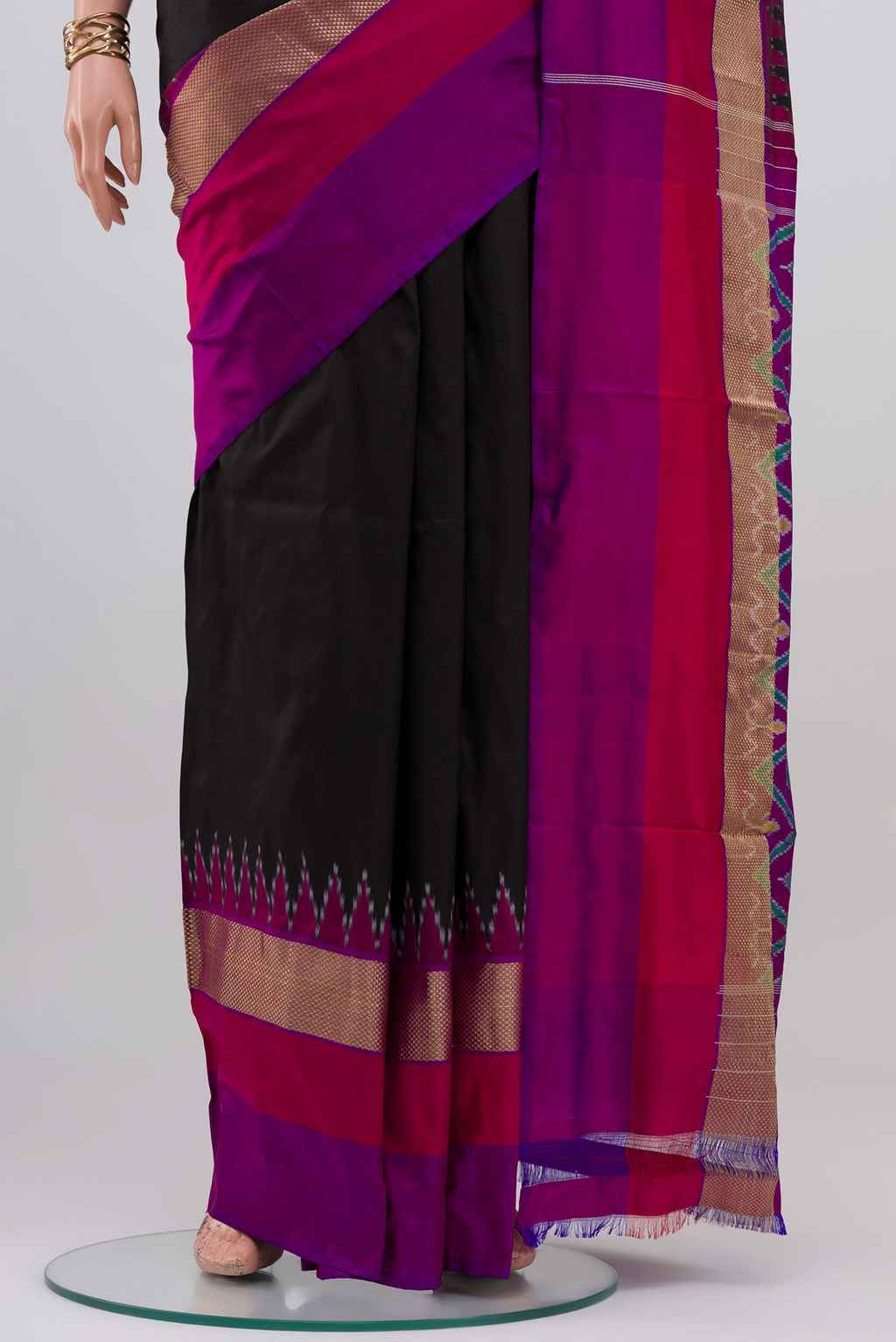 Pleats and pallu of Black Pochampally Silk Saree with Plain Body and Ganga Jamuna Border. 