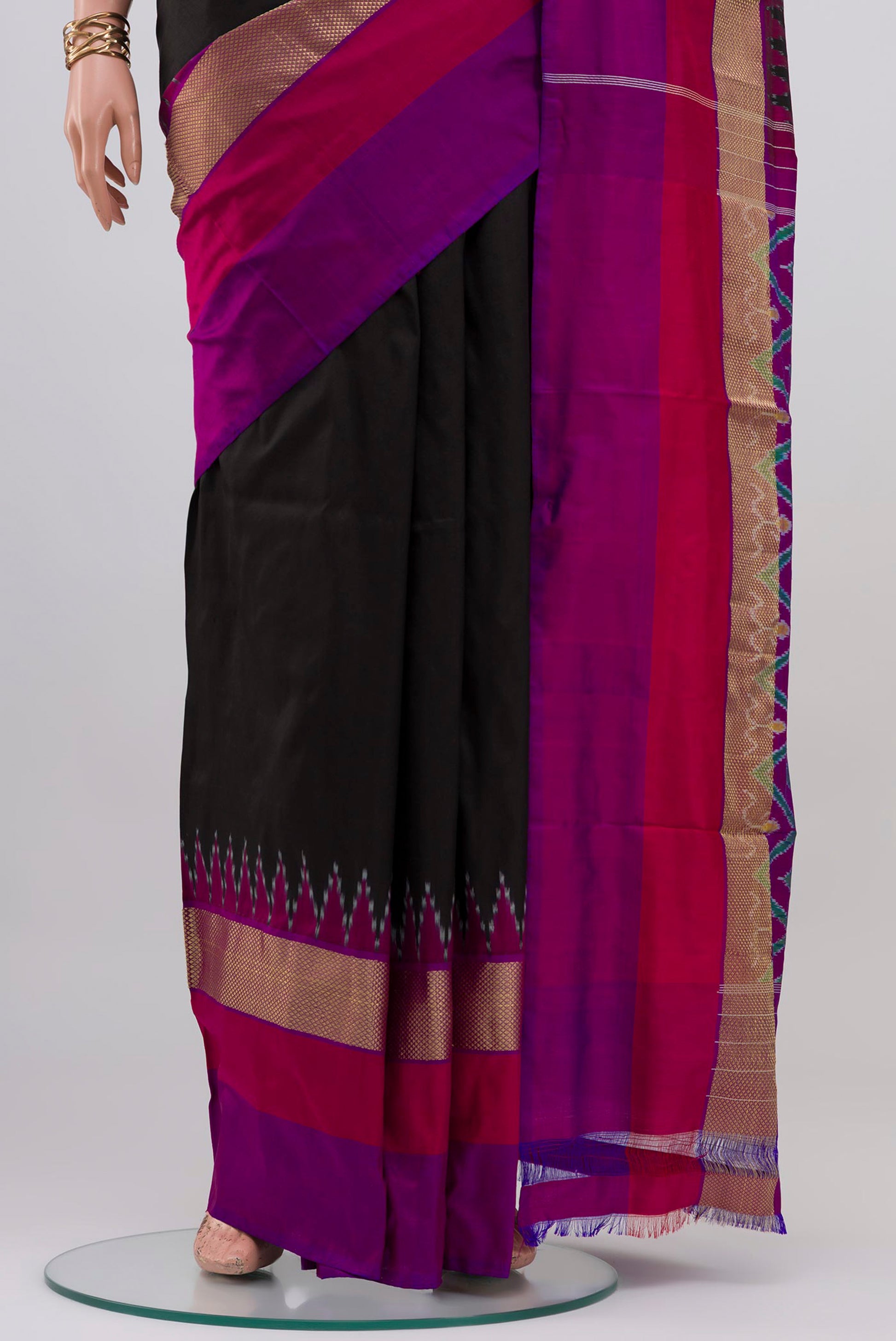 Pleats and pallu of Black Pochampally Silk Saree with Plain Body and Ganga Jamuna Border. 