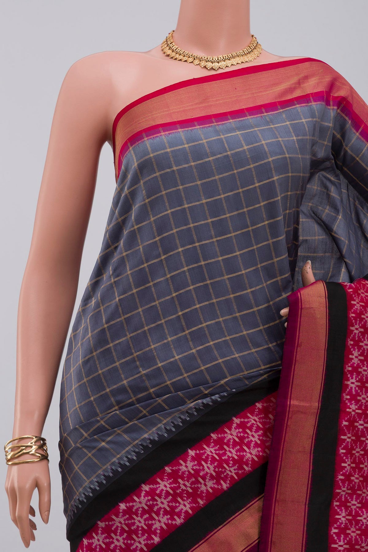 Border image of Grey Pochampally Silk Saree with Checked design on the body and Zari Border. 