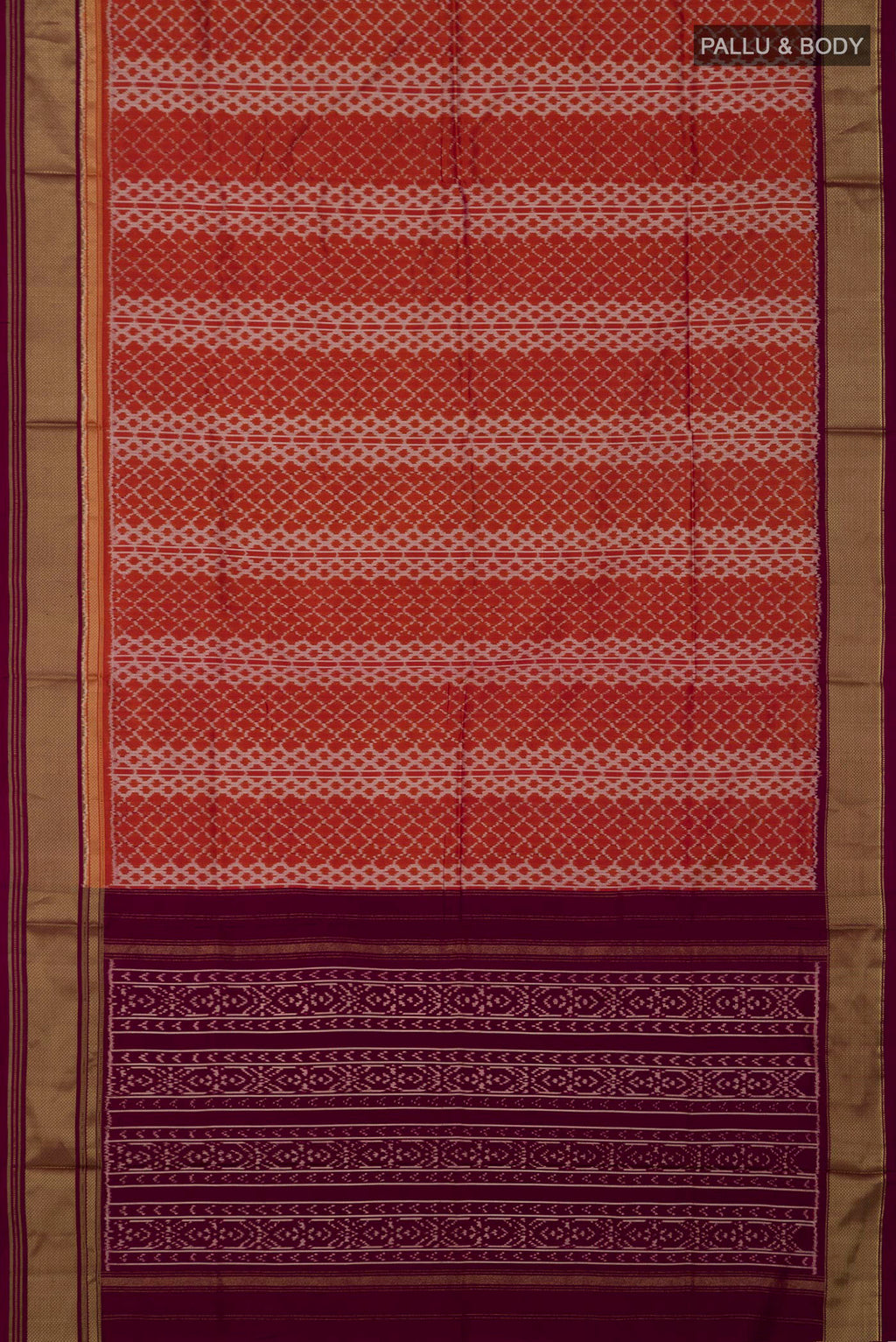 Flat view of Rust Pochampally Silk Saree with Ikat design on the body and Zari Border. 