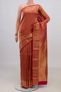 Pure Silk Red Kanjivaram Saree with Zari Brocade on the body and Zari Border.  displayed on a mannequin