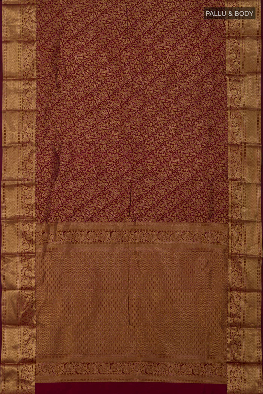 Flat view of Maroon Kanjivaram Silk Saree with Zari Brocade on the body and Zari Border. 