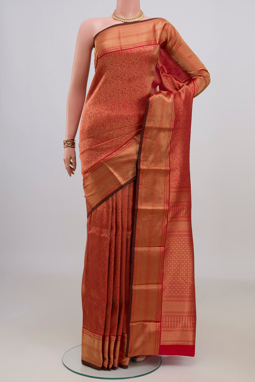 Pure Silk Red Kanchipuram Saree with Zari Brocade on the body and Zari Border.  displayed on a mannequin